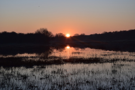 Zonsopkomst in Oranjezon