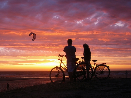 Bicyclists at sunset