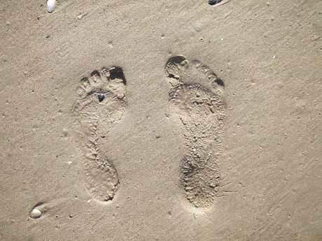 Voeten in het zand