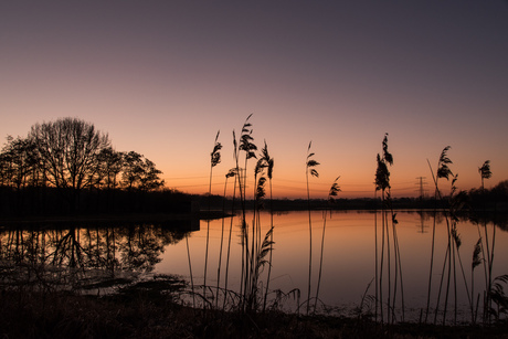 Zonsondergang bij vloeivelden Stadskanaal