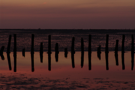 Wadden bij zonsondergang