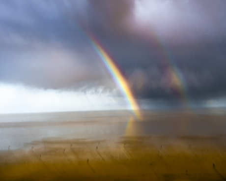 Dubbele regenboog aan het wad