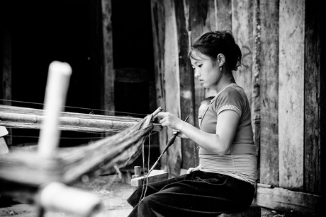 Hemp spinning girl in Sapa, Vietnam