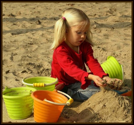 Spelen in het zand