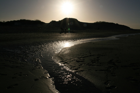 Zonsondergang aan het strand.