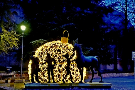 Christmas ball background and statue