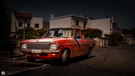 Old car in old town