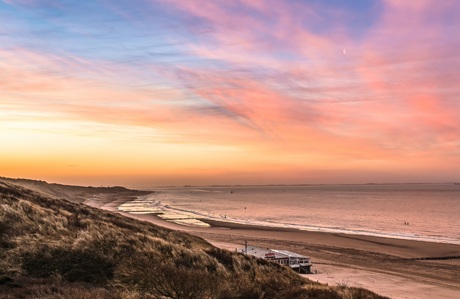 Opkomende zon en ondergaande maan