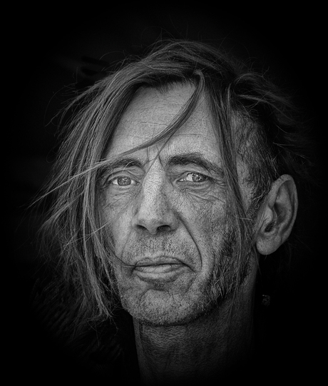 portrait van een gitarist