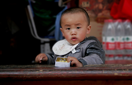 child playing with box