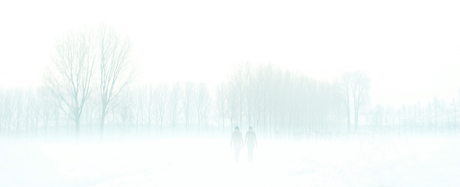 Two people in the snow...
