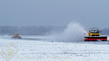 Sneeuwschuivers at work