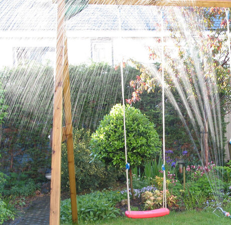 Regensproeier in de zon