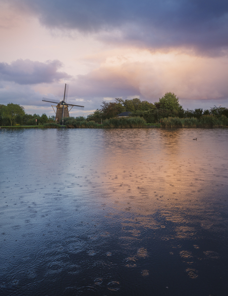 Regen en zon langs de Amstel