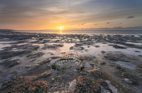 Zonsondergang op het Friese wad