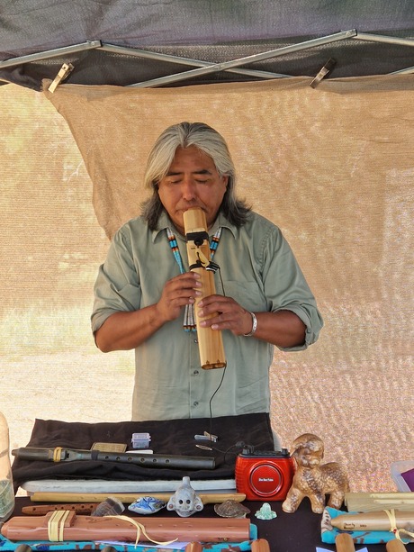 Sjaman playing flute