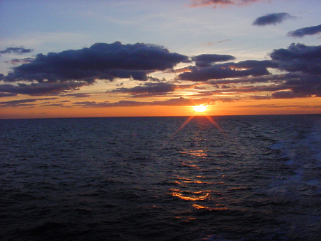 zonsondergang op zee