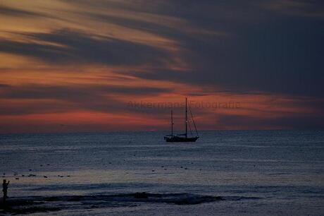 Zon's ondergang Scheveningen