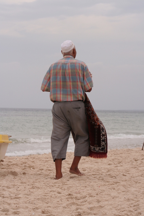 Man op strand