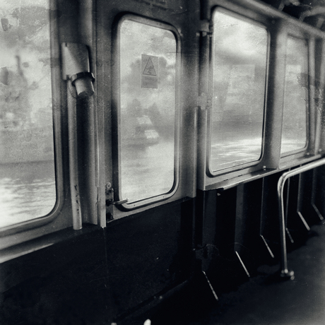 through the empty windows on the ferry I see that the world has been erased