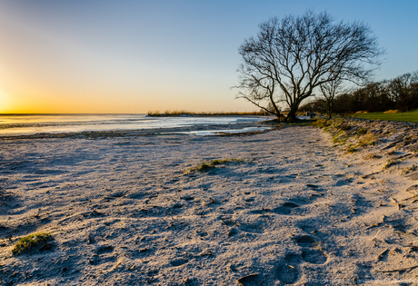 Zonsondergang op het strand