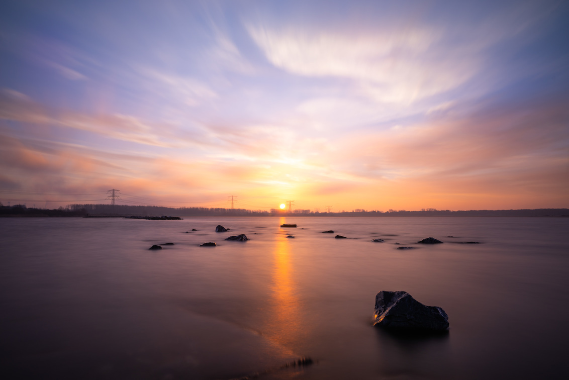 Zondsopkomst Oostvoorne meer foto van DollysFotografie Zoom.nl