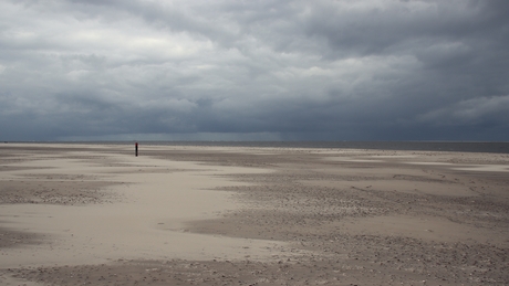 Leegte op het strand