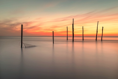 Strakke waddenzee zonsondergang 