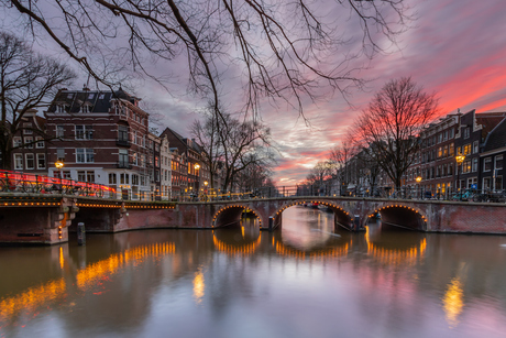 Zonsondergang aan de Amsterdamse grachten