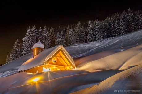 Little lovely church in the snow