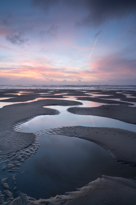 Strand zonsondergang