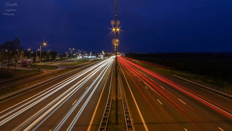 Light trails above the highway 