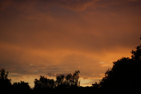 Zonsondergang vanuit het raam