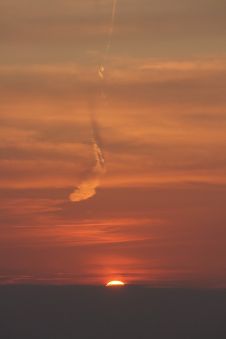 Zonsondergang aan strand