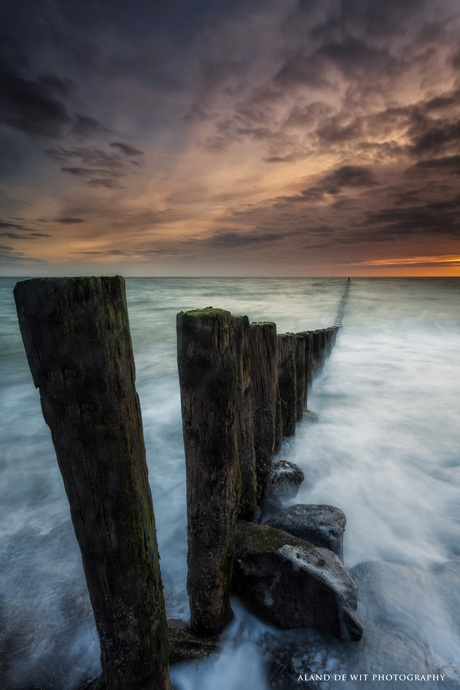 Poles, waves and sunset