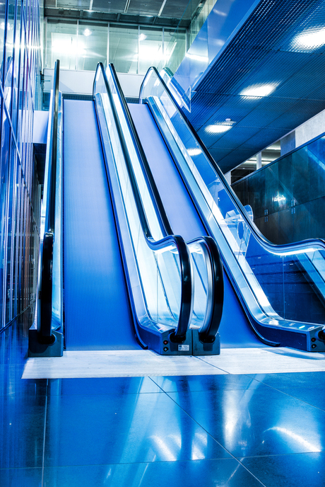 Escalator slide