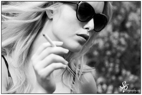 A blonde with sunglasses 2