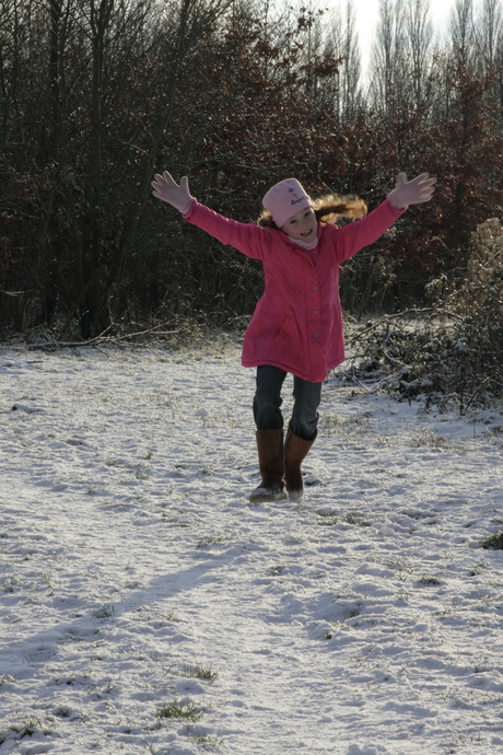 Rachelle jumping snow