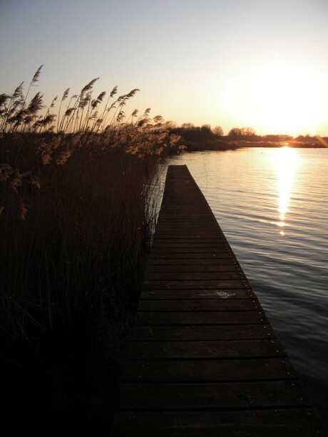 Zonsondergang bij het water