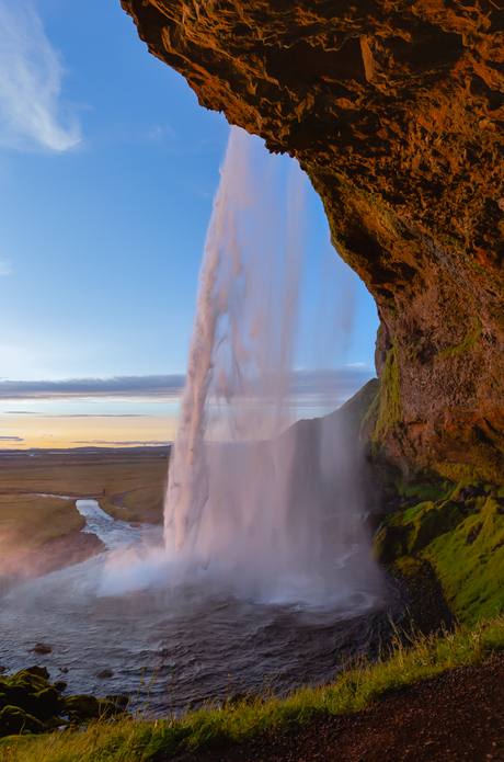 Under the waterfall