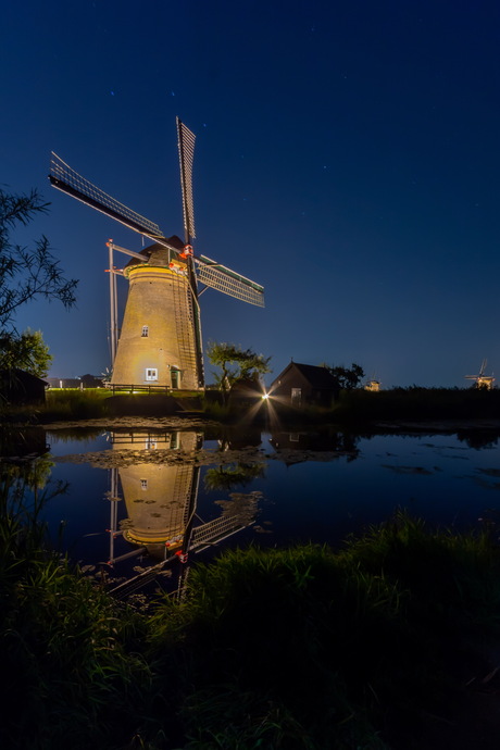 Kinderdijk weerspiegeling van een molen