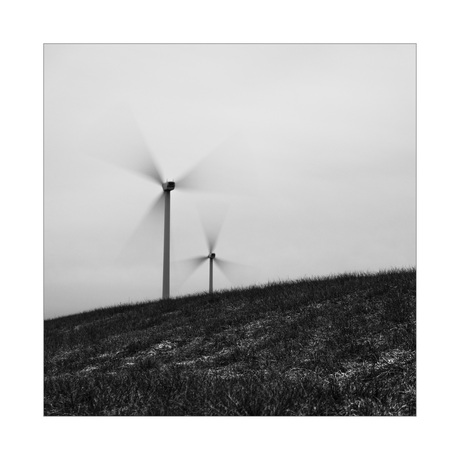 Wind turbines in windy day