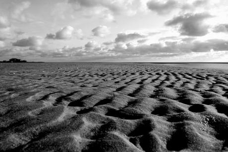 Ondergaande zon over het strand