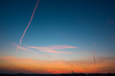 Zonsondergang met Vliegtuig