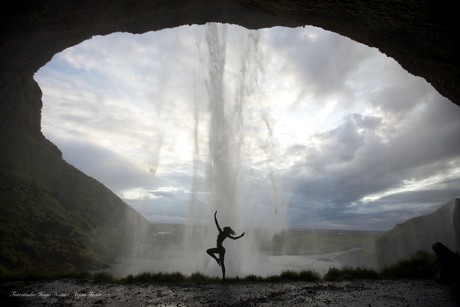 Artnude behind the waterfall in Iceland