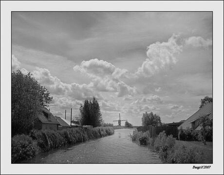 Molen en stapel(s)wolken