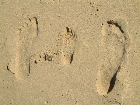 Voeten in het zand