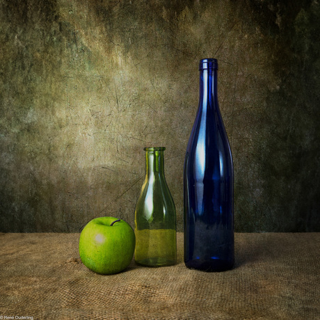 flessen en een appel