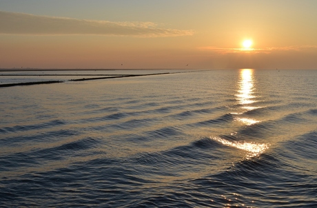 Zonsondergang op de pier van Holwerd