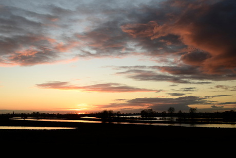 Ondergaande zon, Hemelrijkse Waard